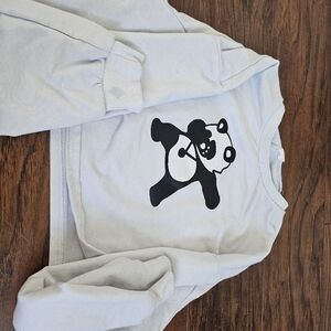a super cute white sweatshirt for kids featuring a dabbing panda on it!